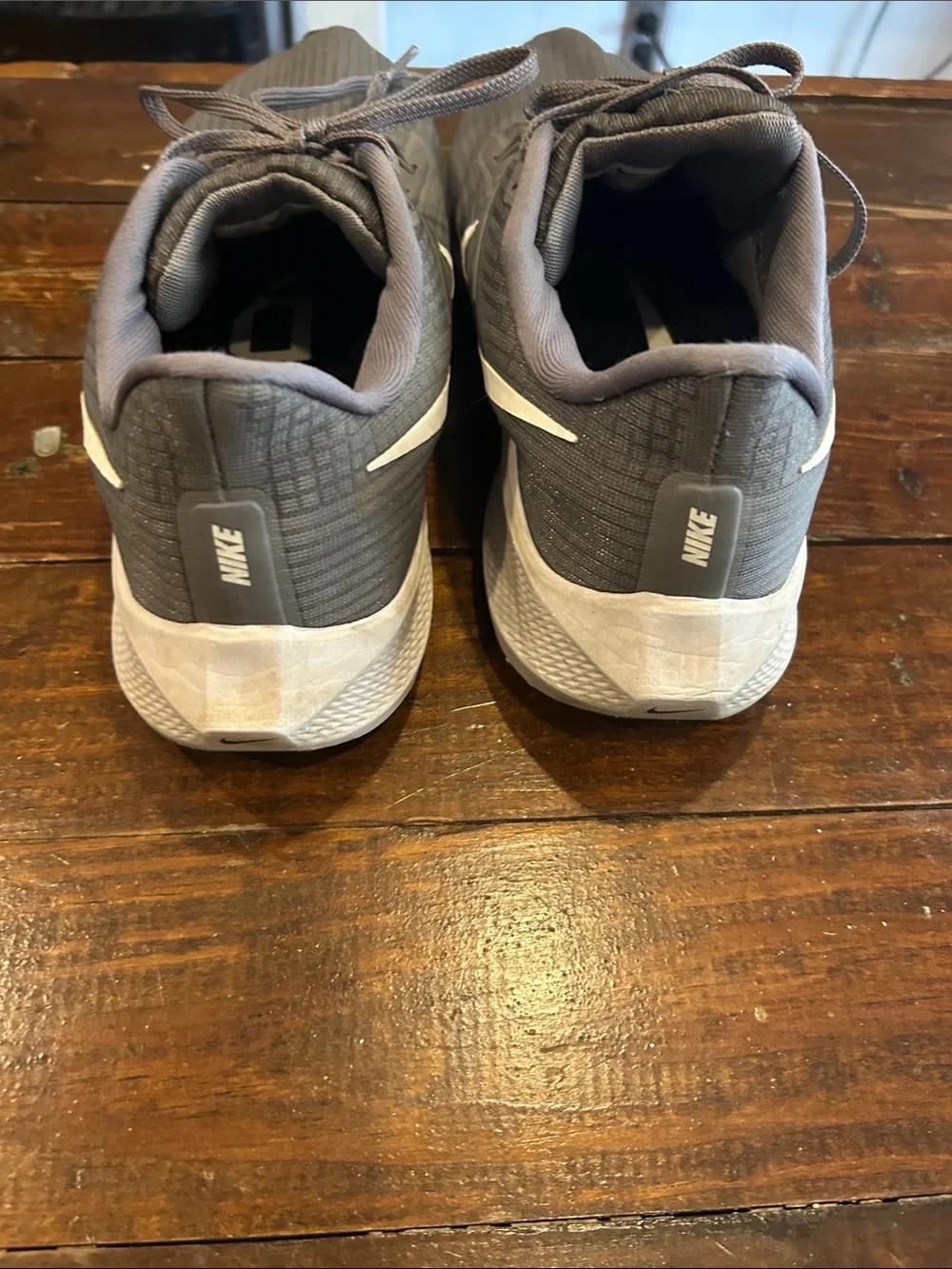 Nike Men’s Gray Athletic Running Shoes with White Swoosh